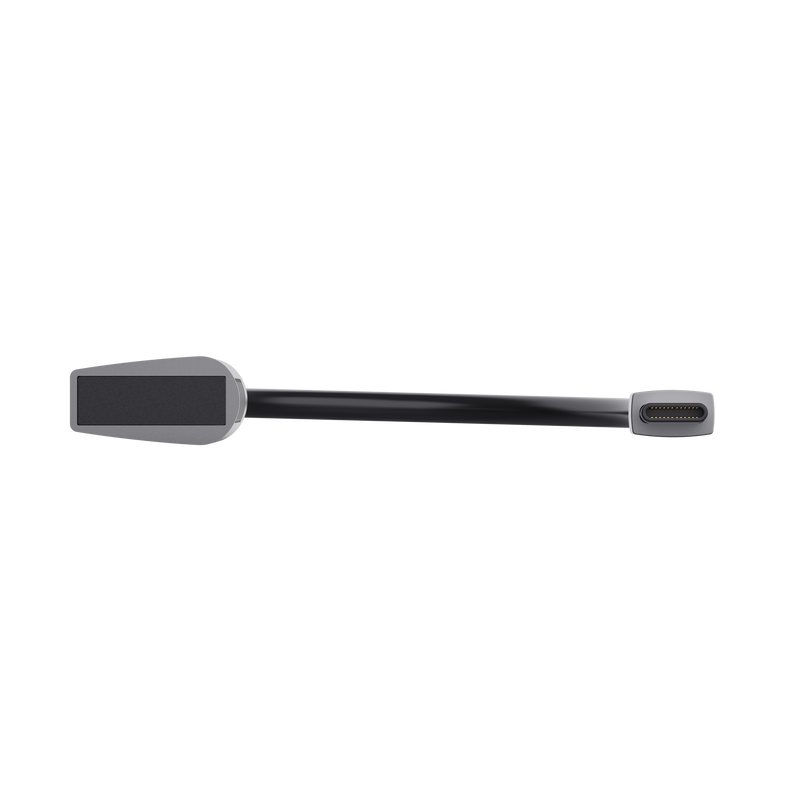 Un cable USB-C negro con conectores grises sobre un fondo negro.