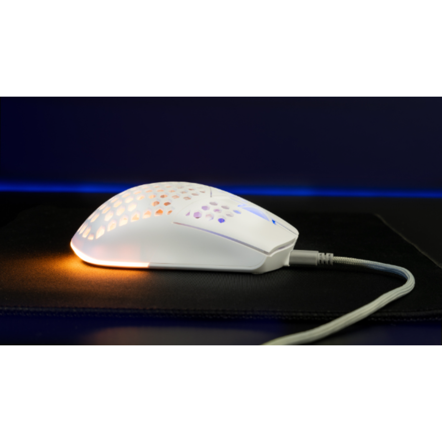 White gaming mouse with a honeycomb design, lit with orange and blue lights.