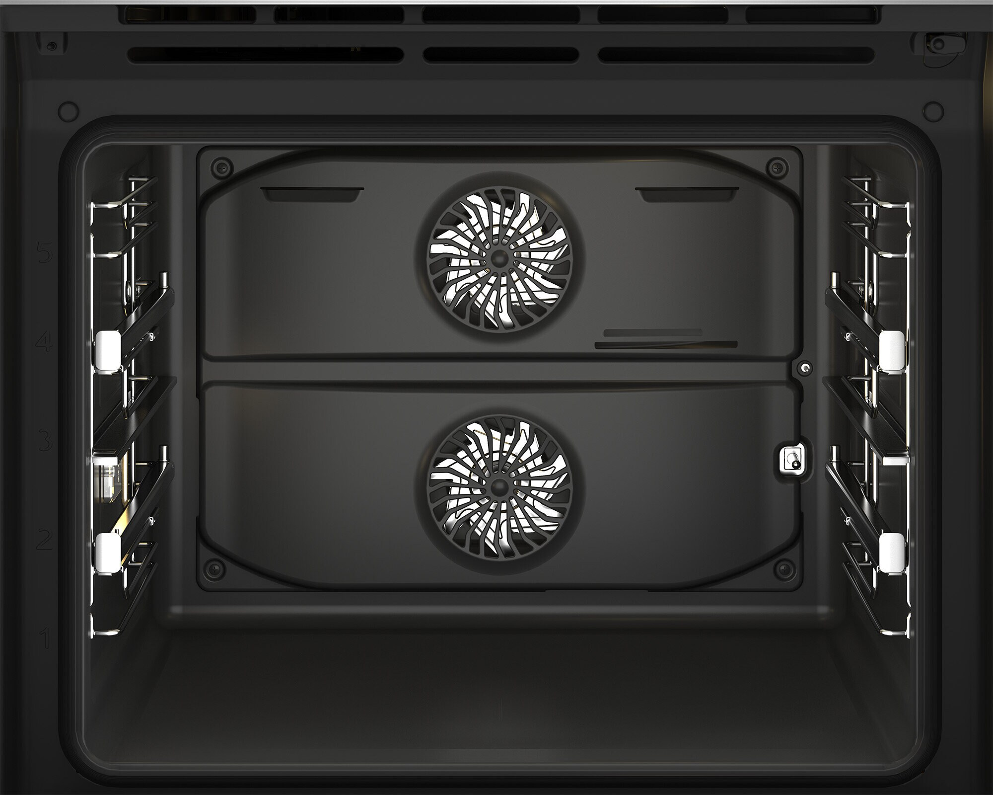 Wnętrze piekarnika z dwoma łopatkami wentylatora i światłami. Ciemne wnętrze.