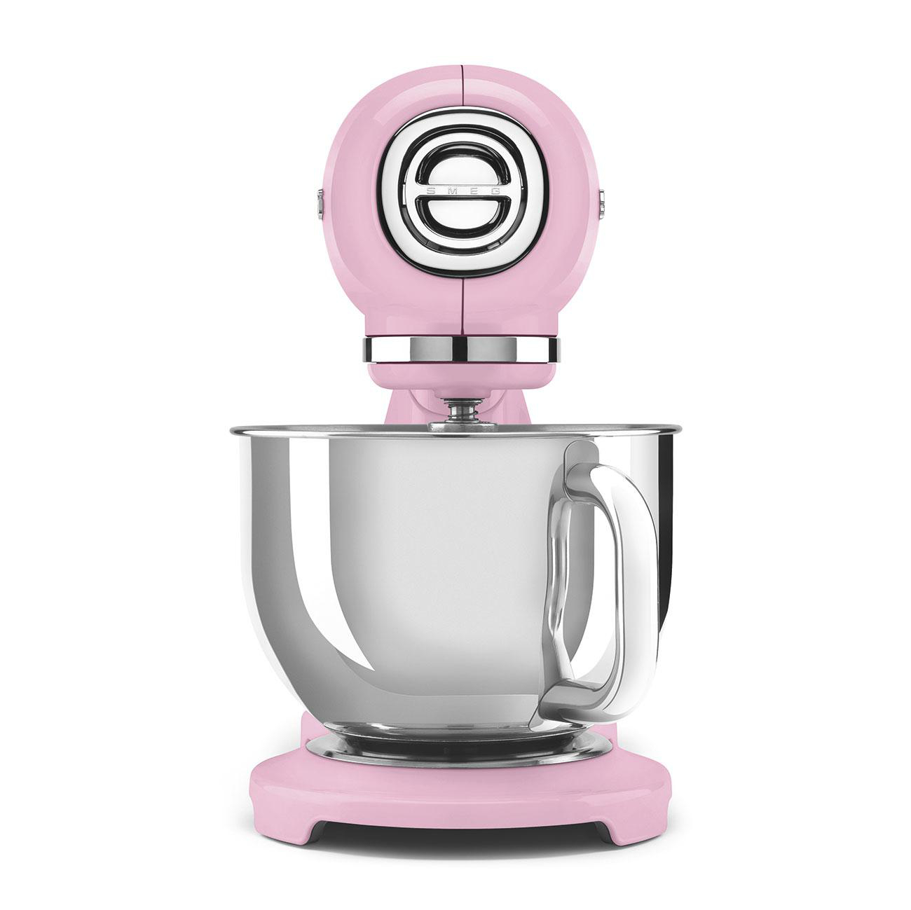 Ein rosafarbener Küchenmixer mit Edelstahlschüssel.