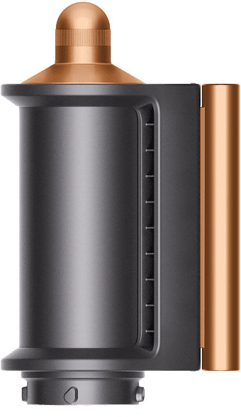 Appareil noir et bronze, forme cylindrique, avec un dessus cuivré.