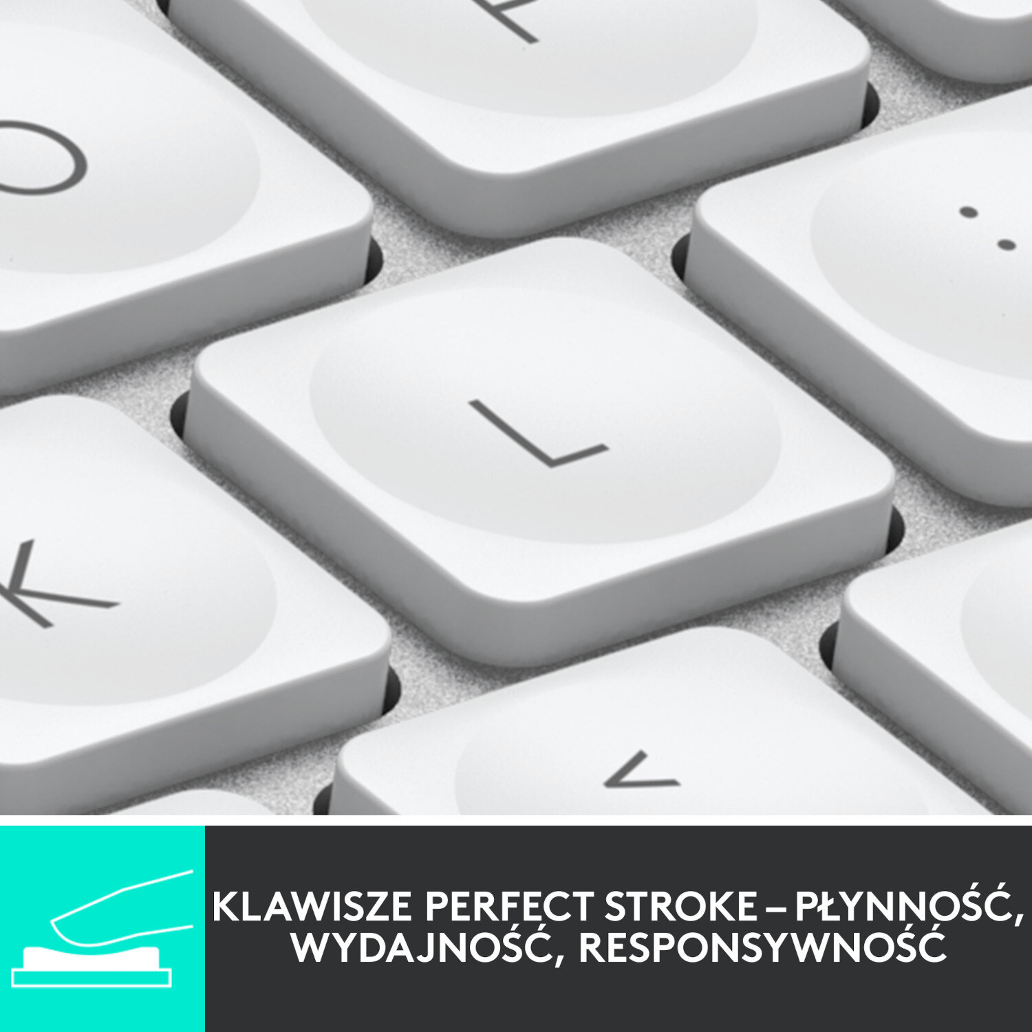 Zbliżenie białych klawiszy klawiatury. Litera 'L' jest wyraźnie widoczna.
