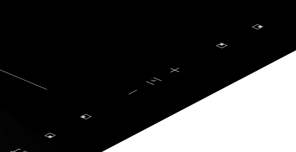 Czarna płyta grzewcza z oznaczeniami sterowania. Widok diagonalny, białe linie i symbole.