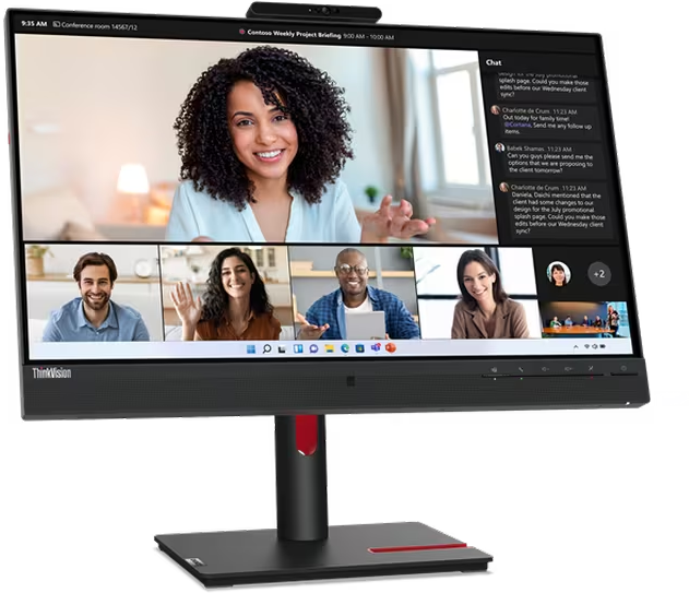 Der Monitor zeigt einen Videoanruf mit einer lächelnden Frau und mehreren anderen Personen. Chat-Fenster rechts.