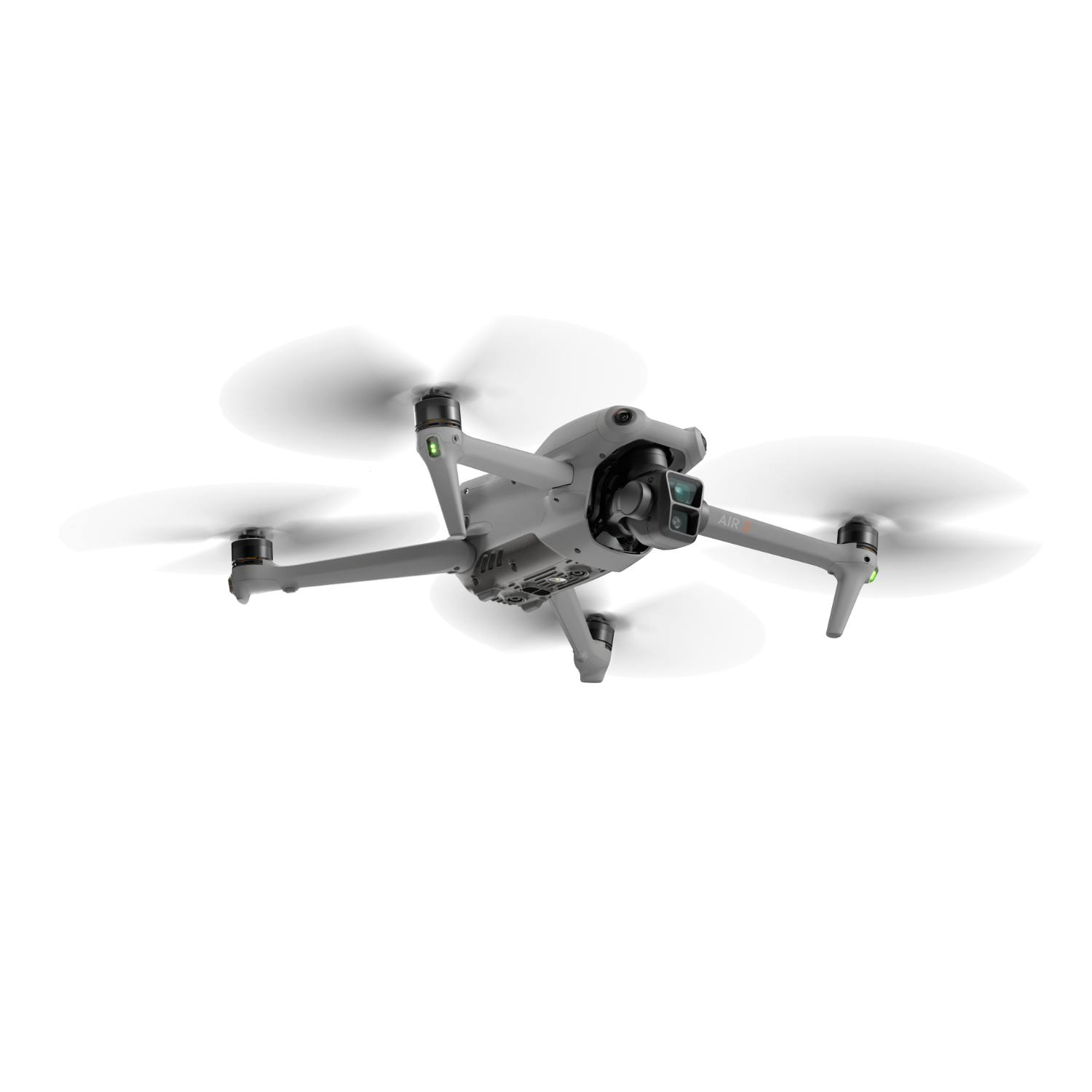 Een grijze drone met vier propellers in de lucht, tegen een witte achtergrond.
