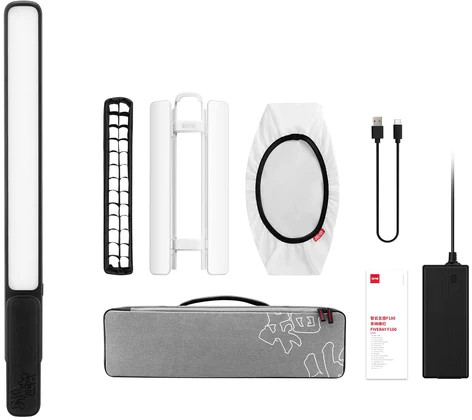 Un kit d'équipement photographique comprenant une lumière, un chargeur et des accessoires.