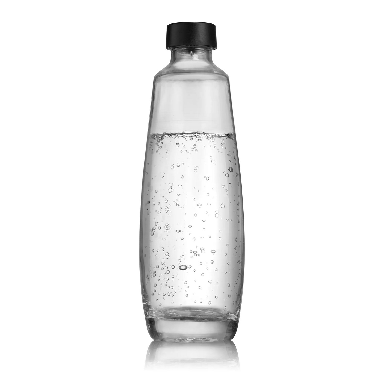 A clear glass soda bottle with bubbles inside. It has a black cap and is on a white surface.