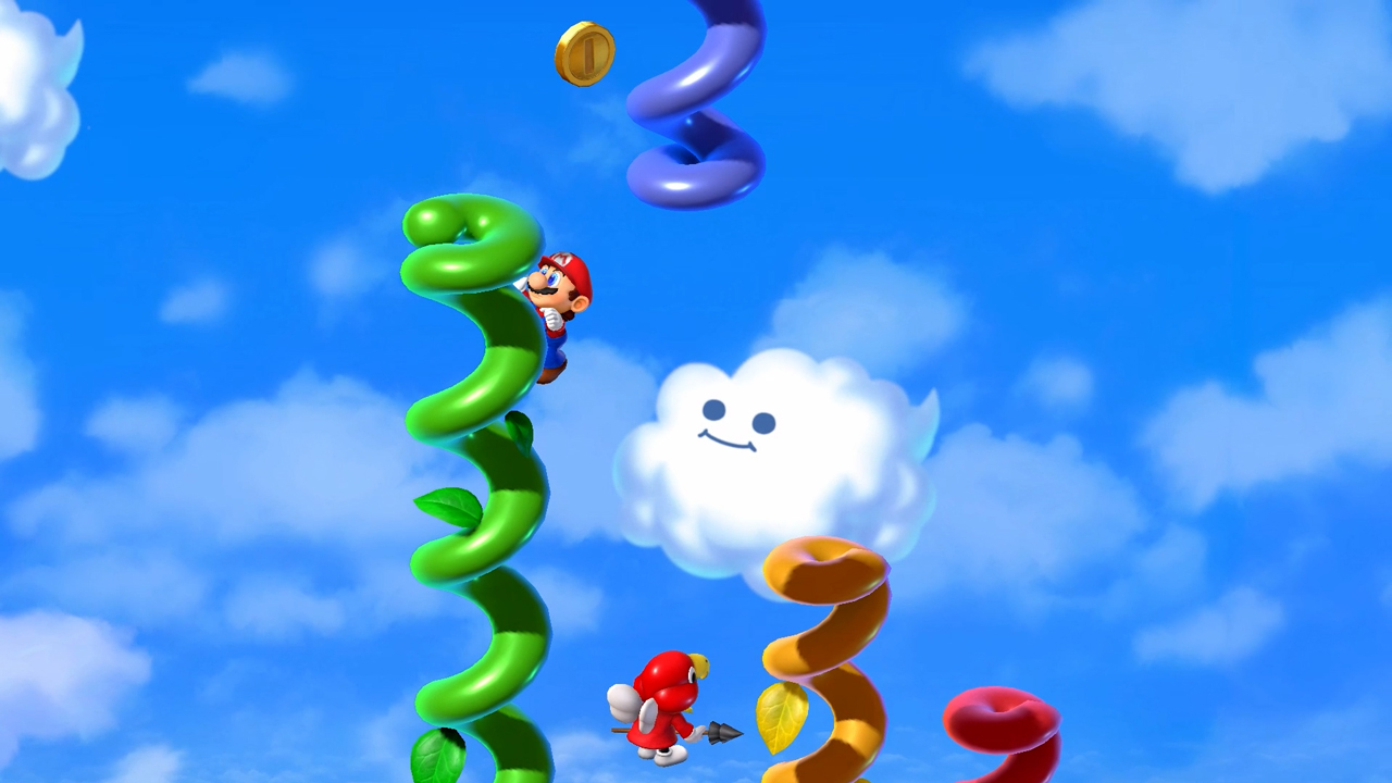 Mario springt auf eine grüne Spirale. Eine Münze schwebt darüber. Eine Wolke lächelt. Blauer Himmel im Hintergrund.