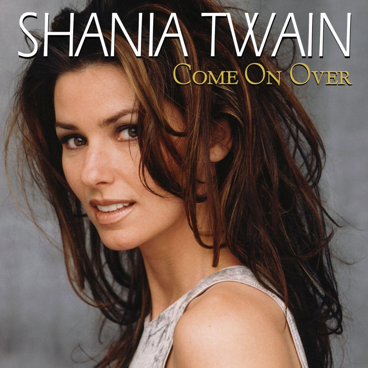 Shania Twain Albumcover. Porträt einer Frau mit braunem Haar. Titel 'Come On Over'.