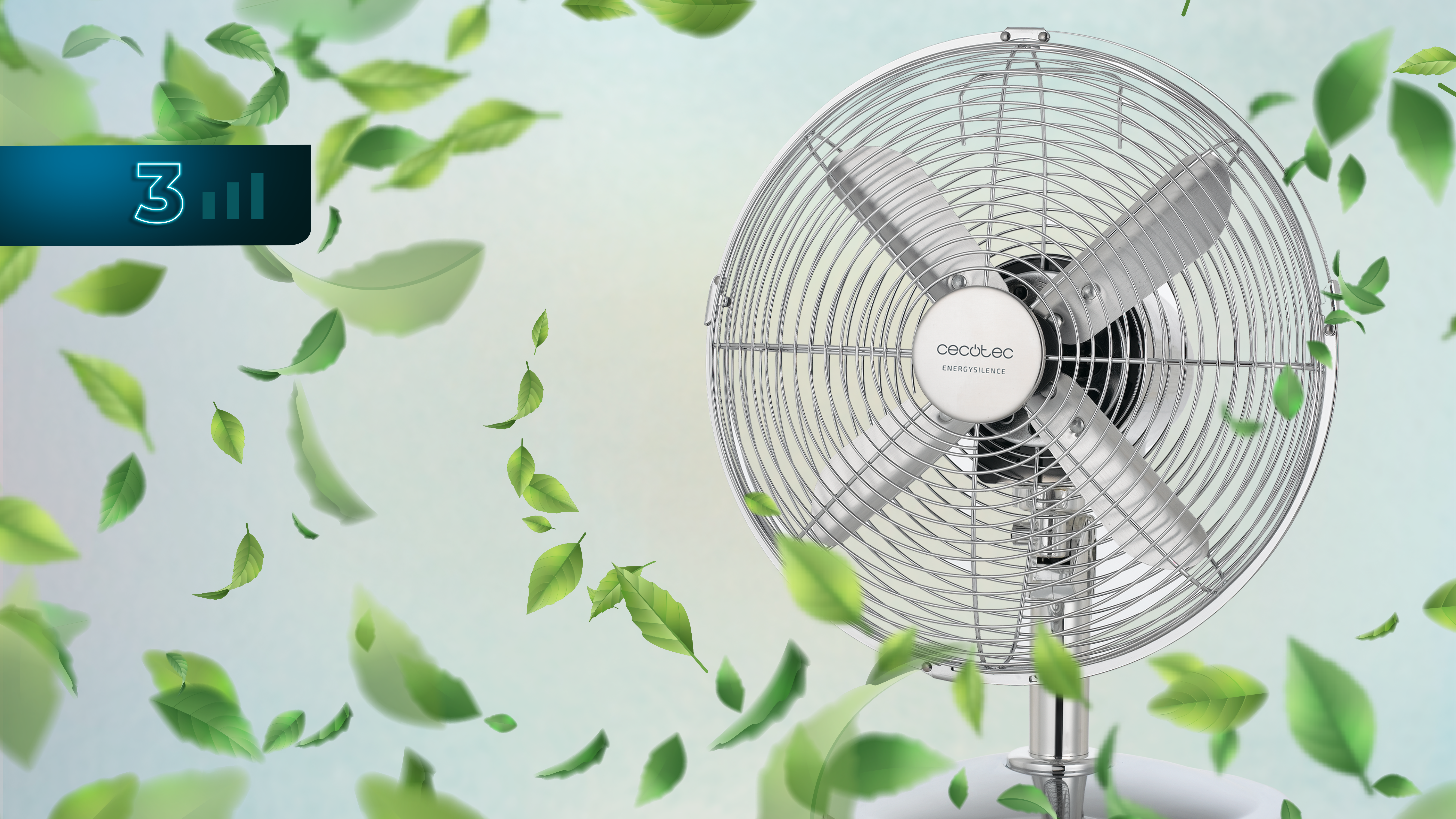 Un ventilador plateado con hojas verdes flotando delante. Una pantalla digital muestra el nivel 3.