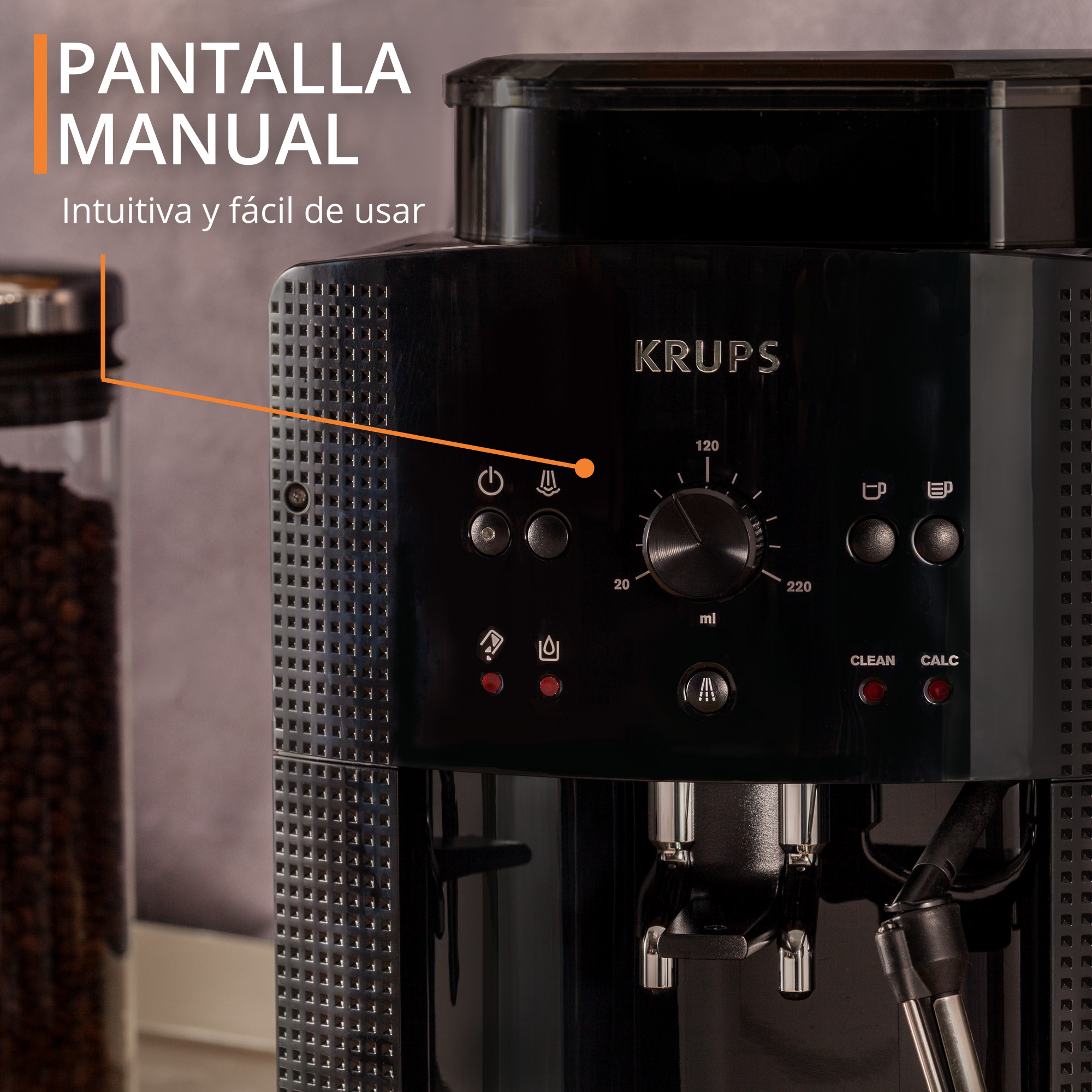 Cafetera Krups negra con controles. Tarro de granos y texto: pantalla manual, intuitiva, fácil de usar.