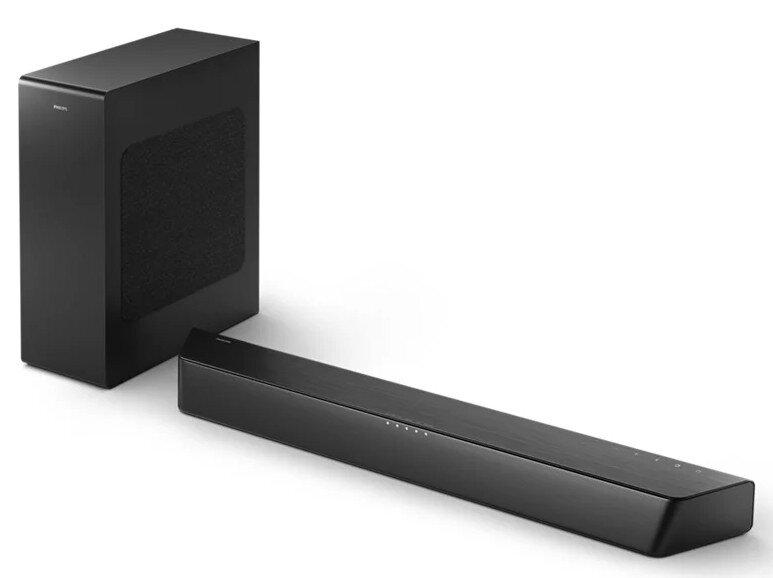 Czarny soundbar i czarny subwoofer na białej powierzchni. Są obok siebie.