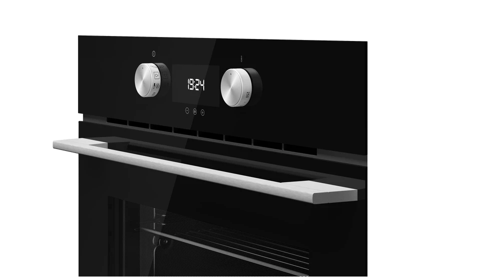 Panel de control de horno con dos diales y pantalla digital '19:24'. Manija clara abajo.