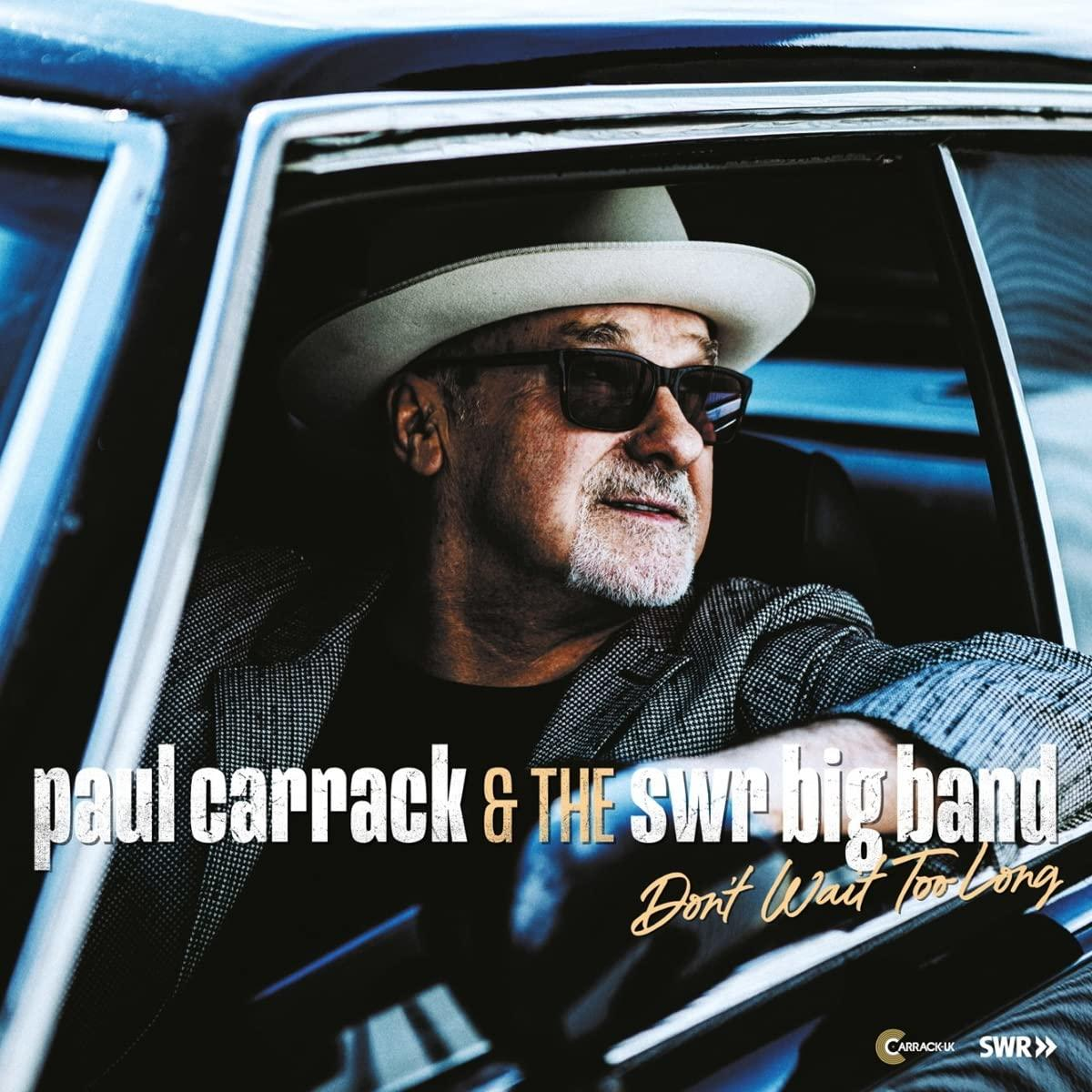 Paul Carrack egy autóban, kalapot és napszemüveget visel. A 'Don't Wait Too Long' cím látható.