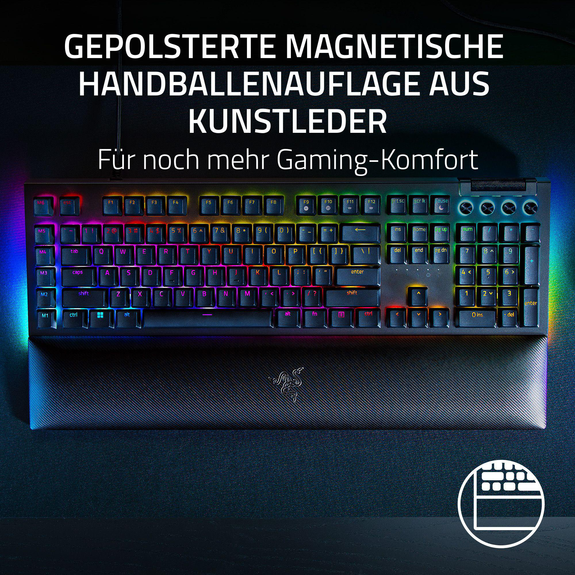 Schwarze Razer-Tastatur mit Handballenauflage, bunten Tasten und Text auf Deutsch.