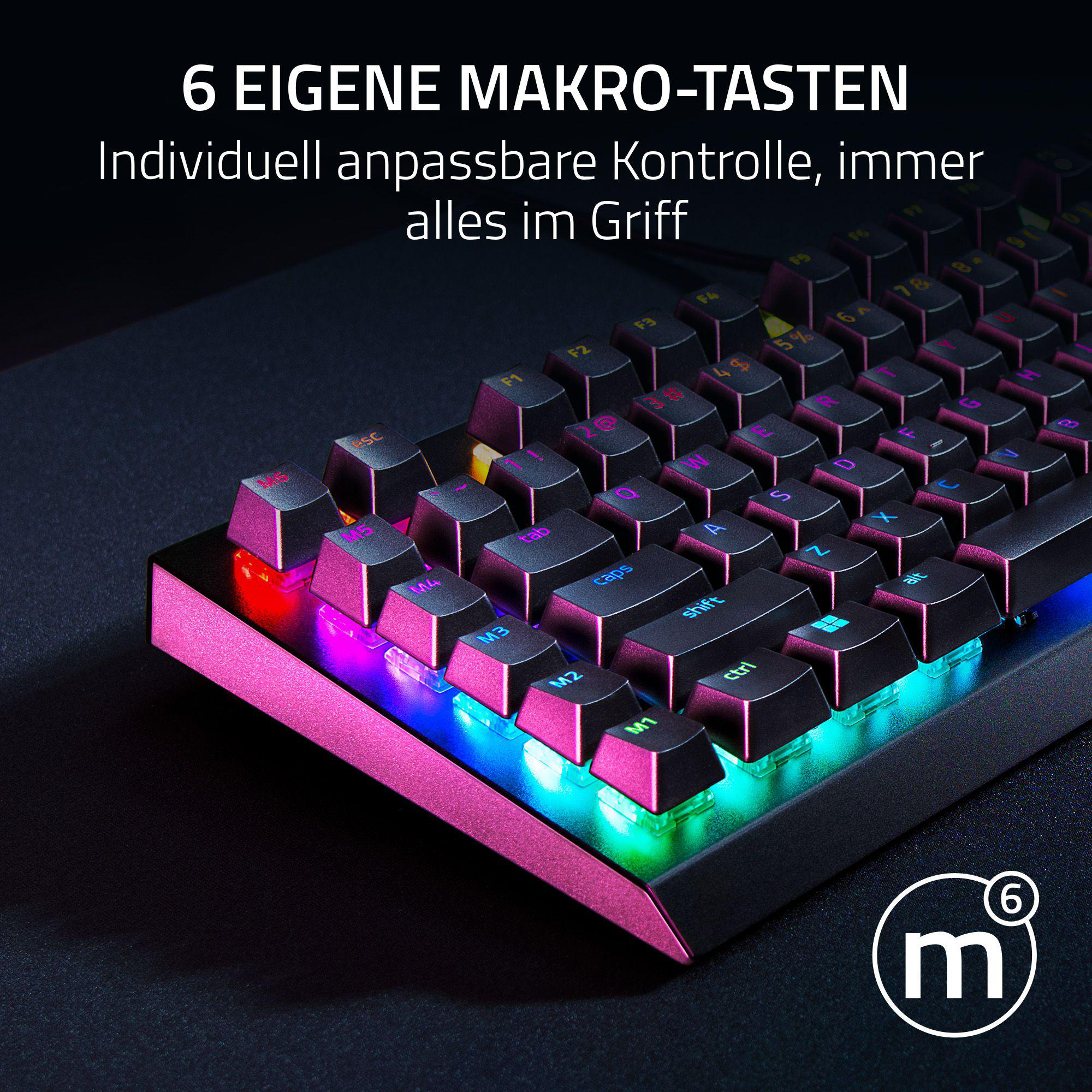 Eine Gaming-Tastatur mit beleuchteten Tasten, einem rosa Rahmen und einem Logo auf dunkler Oberfläche.