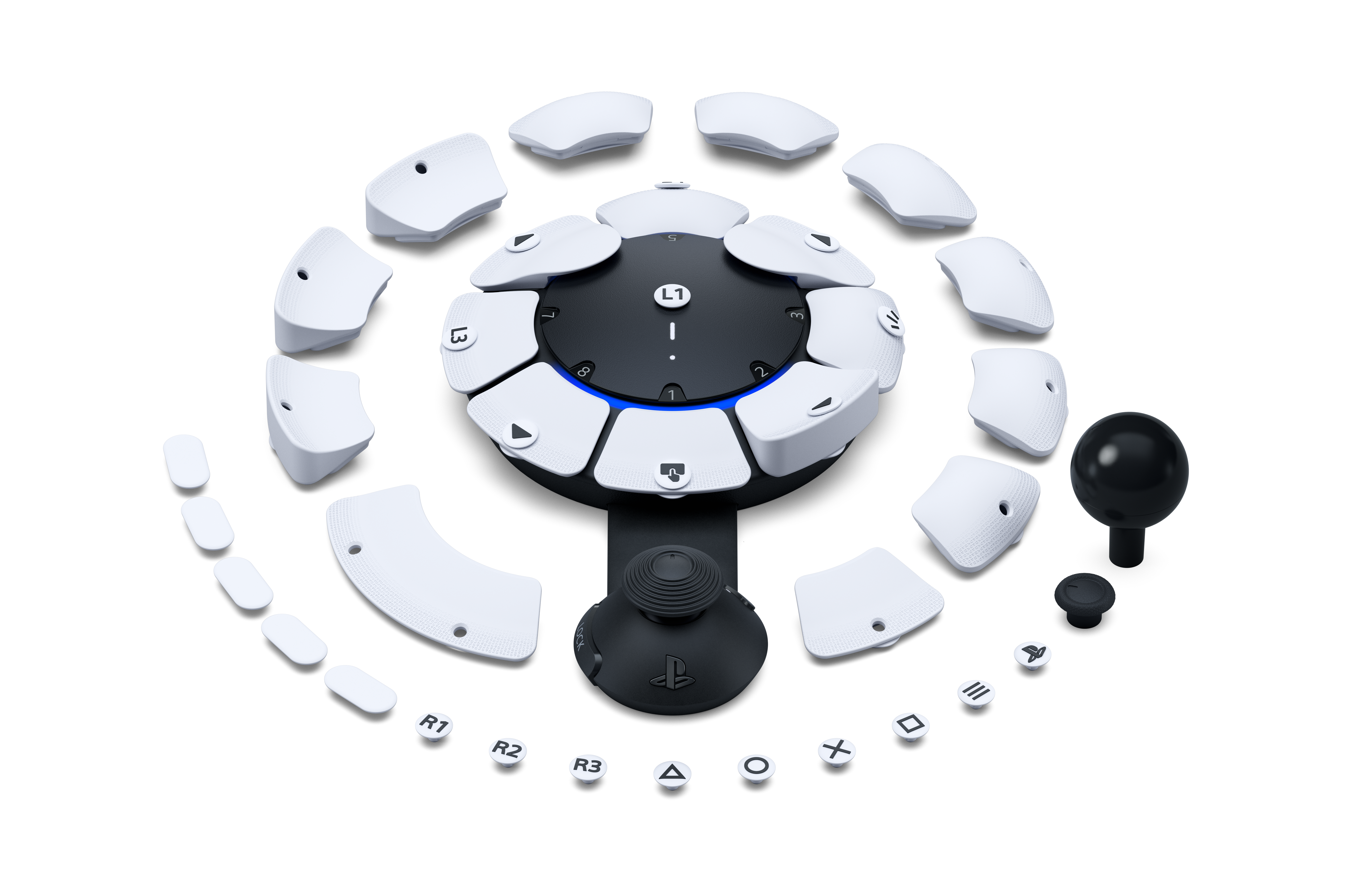 Ein weißer Gaming-Controller mit abnehmbaren Knöpfen, die kreisförmig um ein zentrales Panel angeordnet sind.