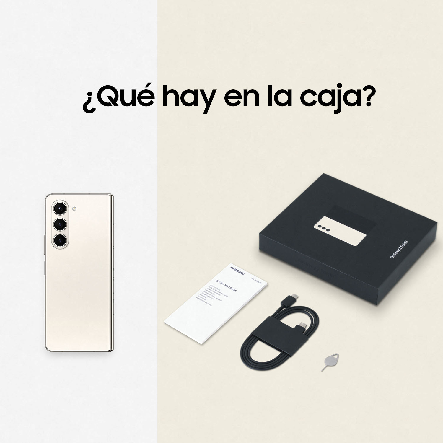 Un teléfono, una caja, un cable y una llave sobre una superficie crema.