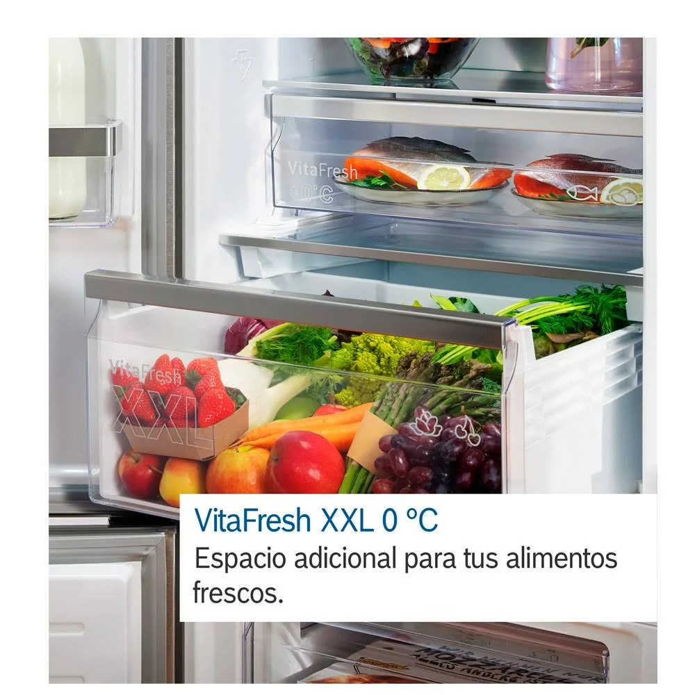 Interior del refrigerador con cajón VitaFresh XXL, mostrando productos frescos.