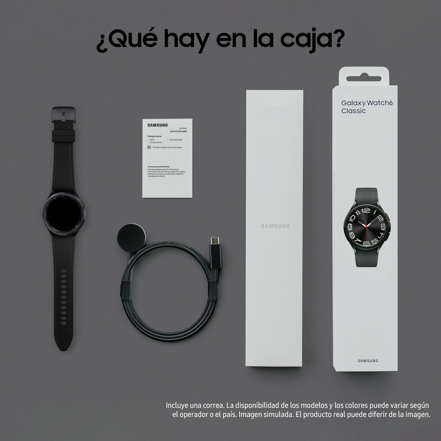 Smartwatch desempaquetado y accesorios: cargador, cable y documentos sobre superficie gris.