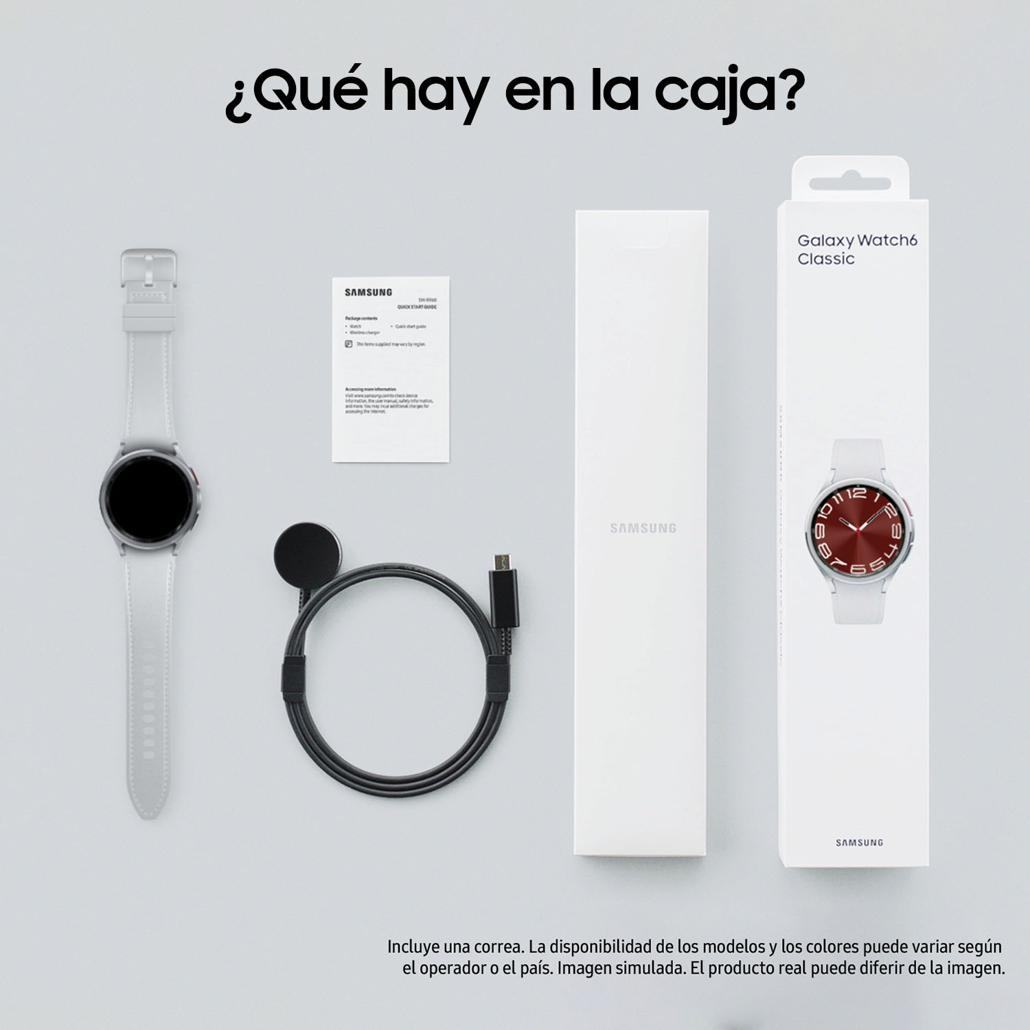 Reloj, cargador y otros accesorios se muestran en una caja blanca, sobre un fondo gris.