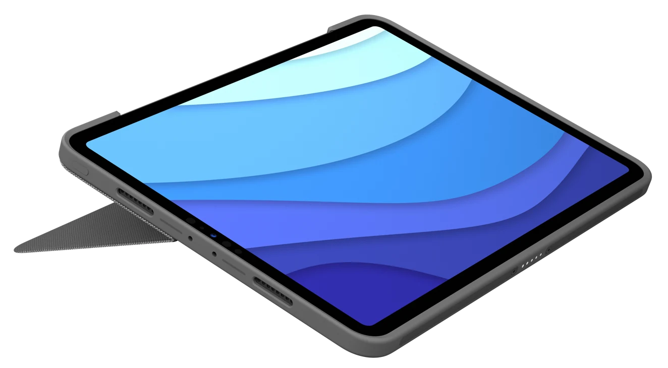 Szürke tablet kék réteges háttérrel a képernyőn. Szögben, fekete felületen.