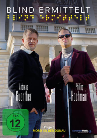 Filmplakat: Zwei Männer, einer mit Stock, vor einem Gebäude. Text auf Deutsch.