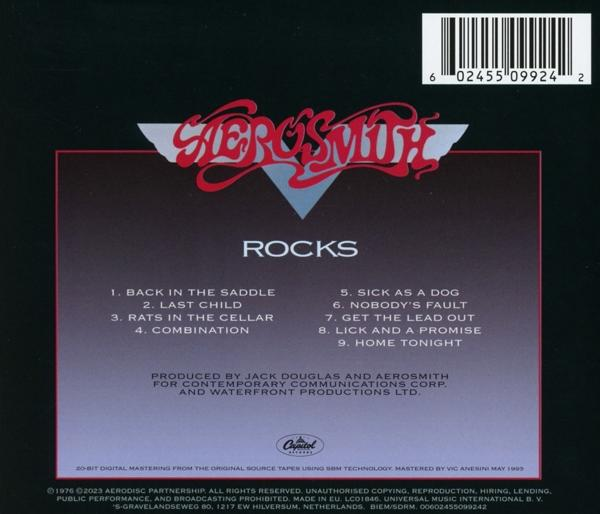 CD-Rückseite mit Text 'Aerosmith Rocks'. Schwarzer Hintergrund.