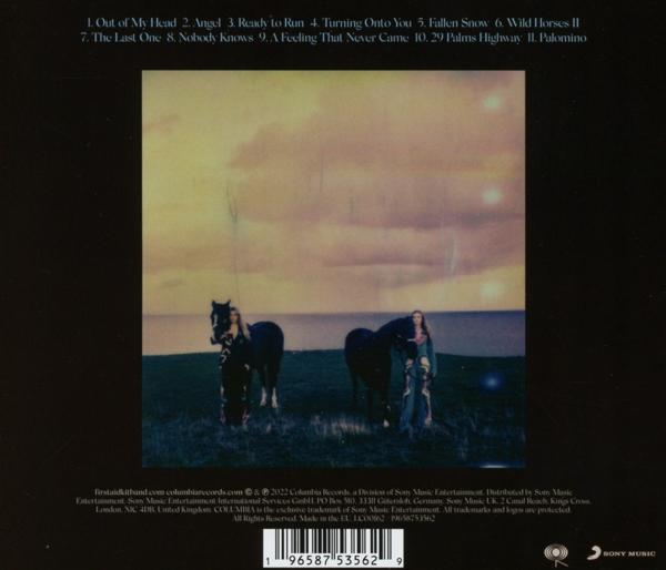 Albumcover mit zwei Pferden und einer Frau auf einem Feld. Enthält Text und einen Barcode unten.