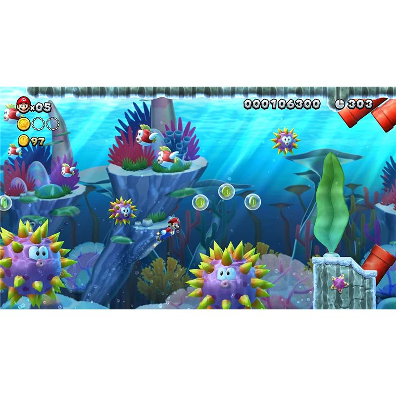 Un nivel submarino de Super Mario con Mario y enemigos. Corales coloridos y burbujas.