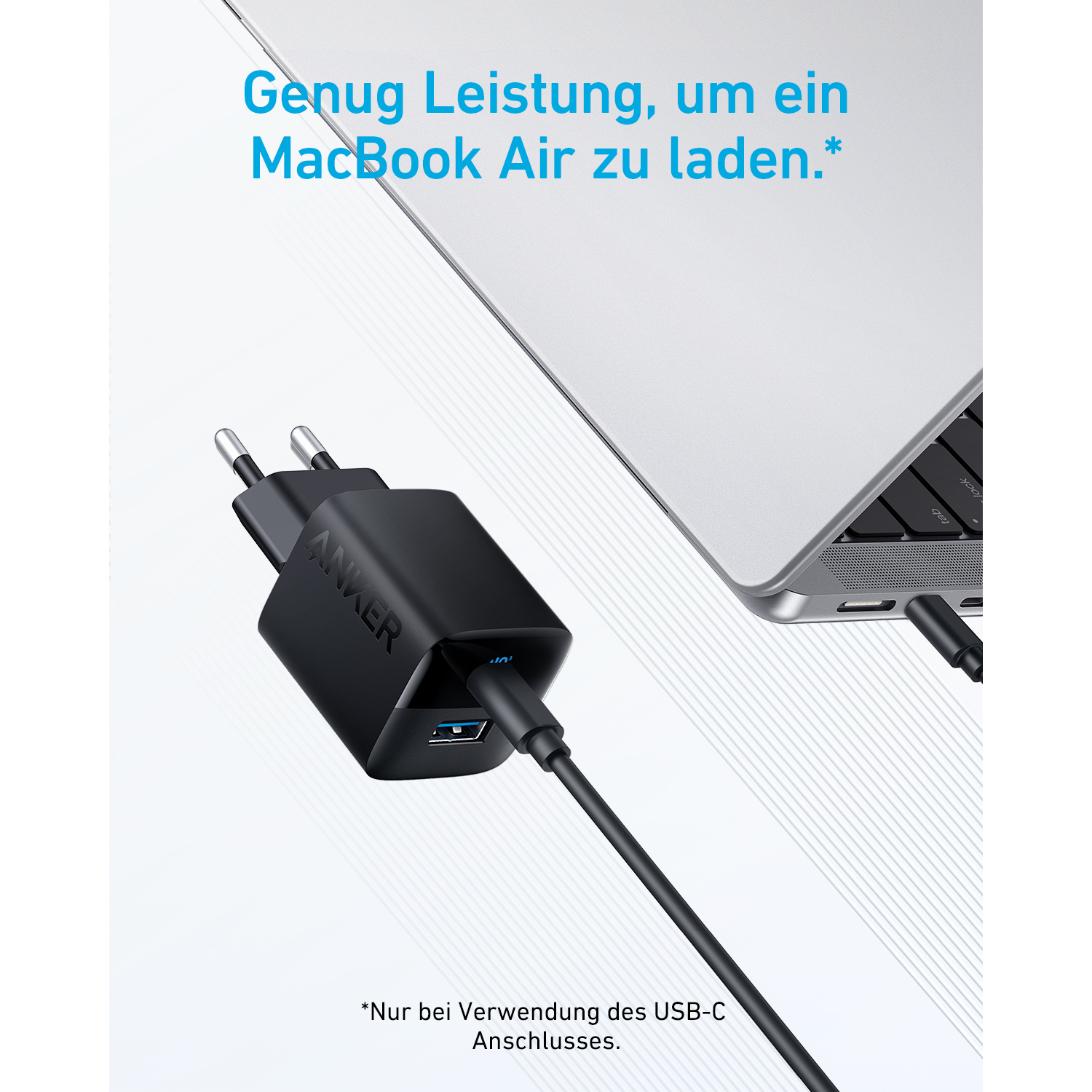 Black Anker charger plugged into a MacBook Air. Text: Enough power to charge a MacBook Air.
