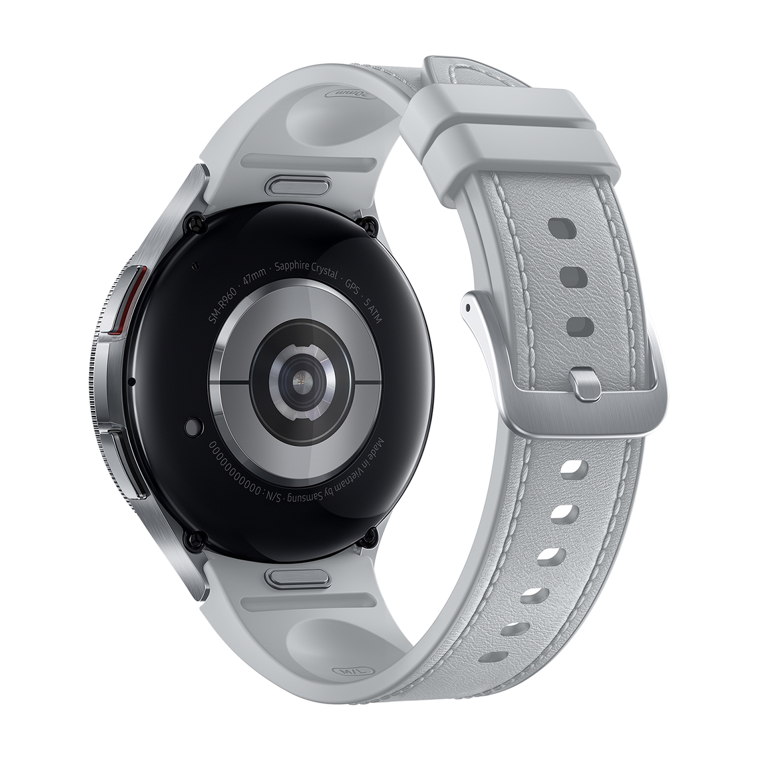 Smartwatch argentato con schermo circolare nero e cinturino bianco. Il retro dell'orologio è visibile.