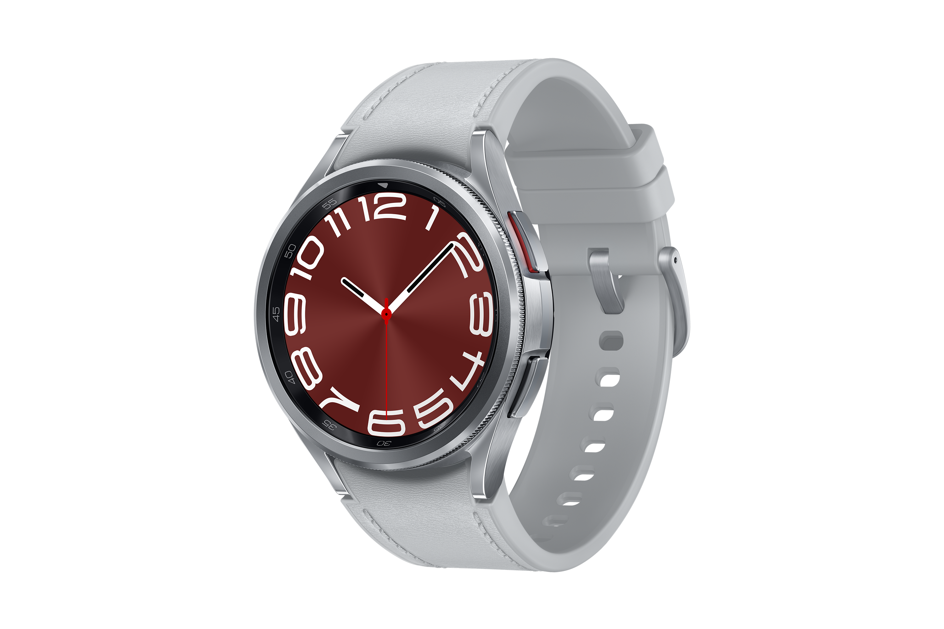 Ezüst okosóra piros számlappal és világosszürke szíjjal fekete háttéren.