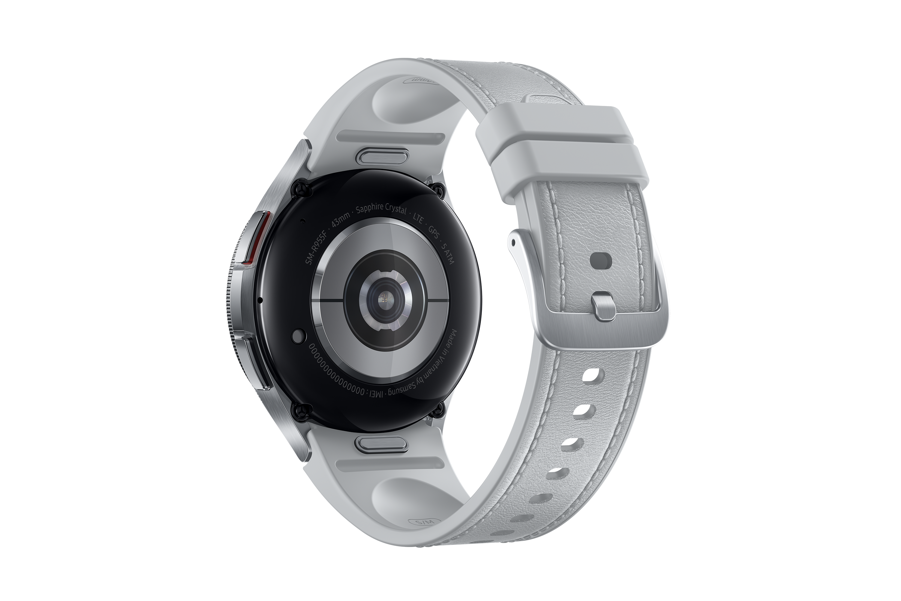 Egy ezüst okosóra hátulnézete fehér szíjjal, érzékelőket és márkajelzést mutat fekete háttér előtt.