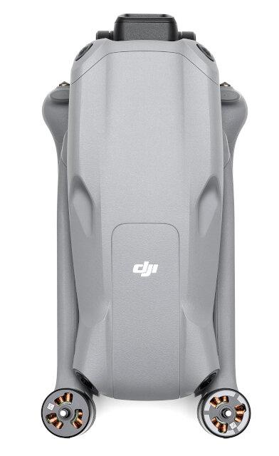 Szary dron z góry. Widoczne logo DJI. Dron na białym tle.