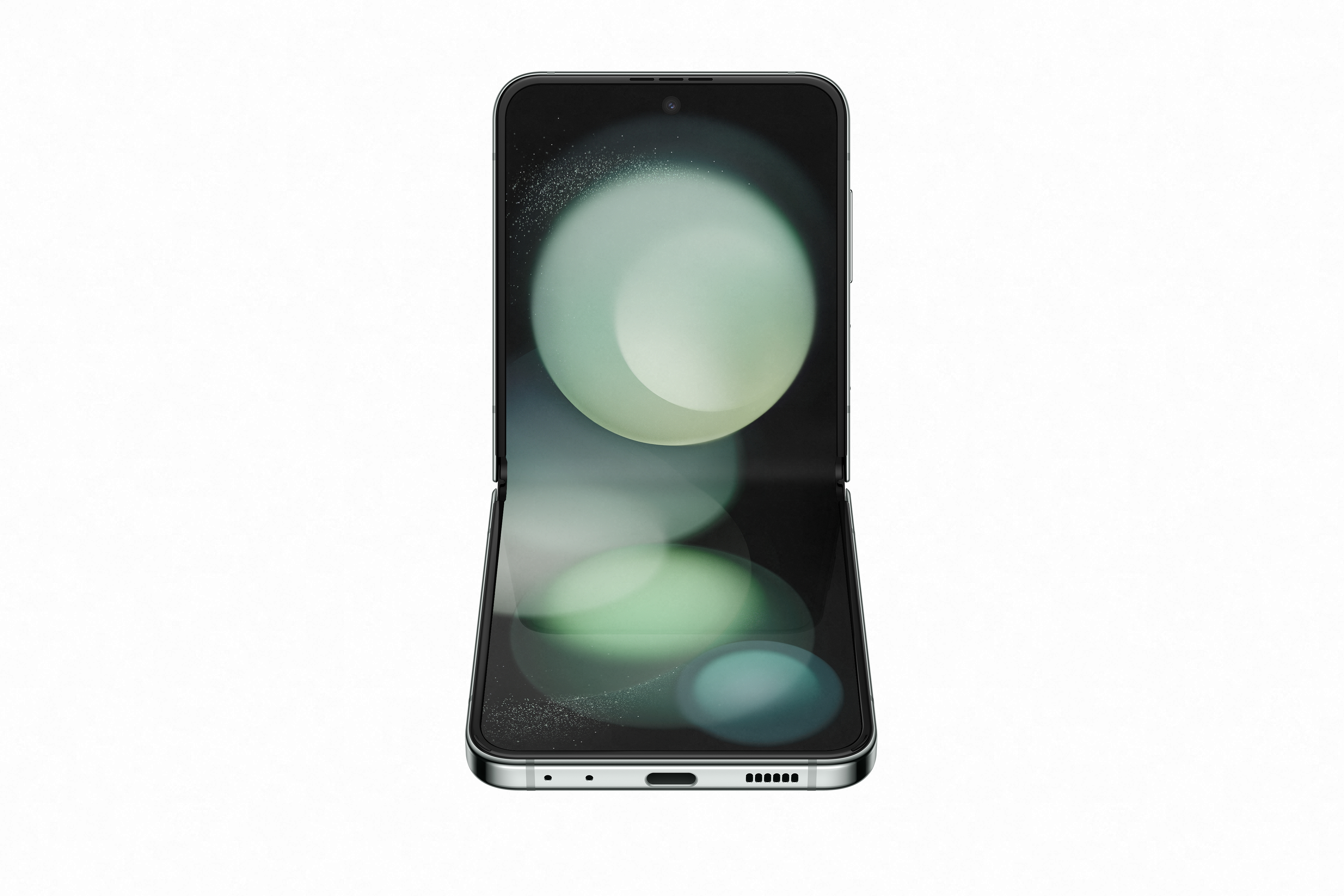 Soyut yeşil ve beyaz şekillerin görüntülendiği bir ekrana sahip, katlanmış siyah bir akıllı telefon.