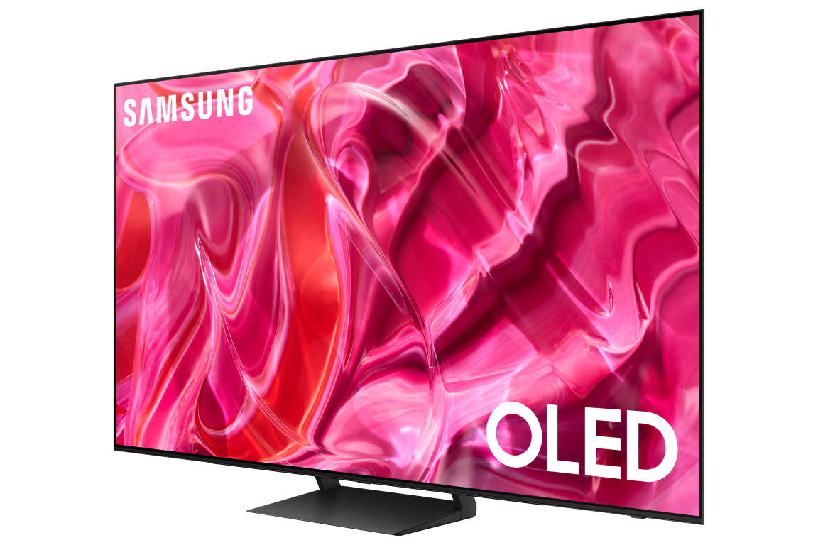 Samsung OLED TV. Siyah çerçeve, OLED ve Samsung logoları görünür. Pembe ve kırmızı soyut arka plan.
