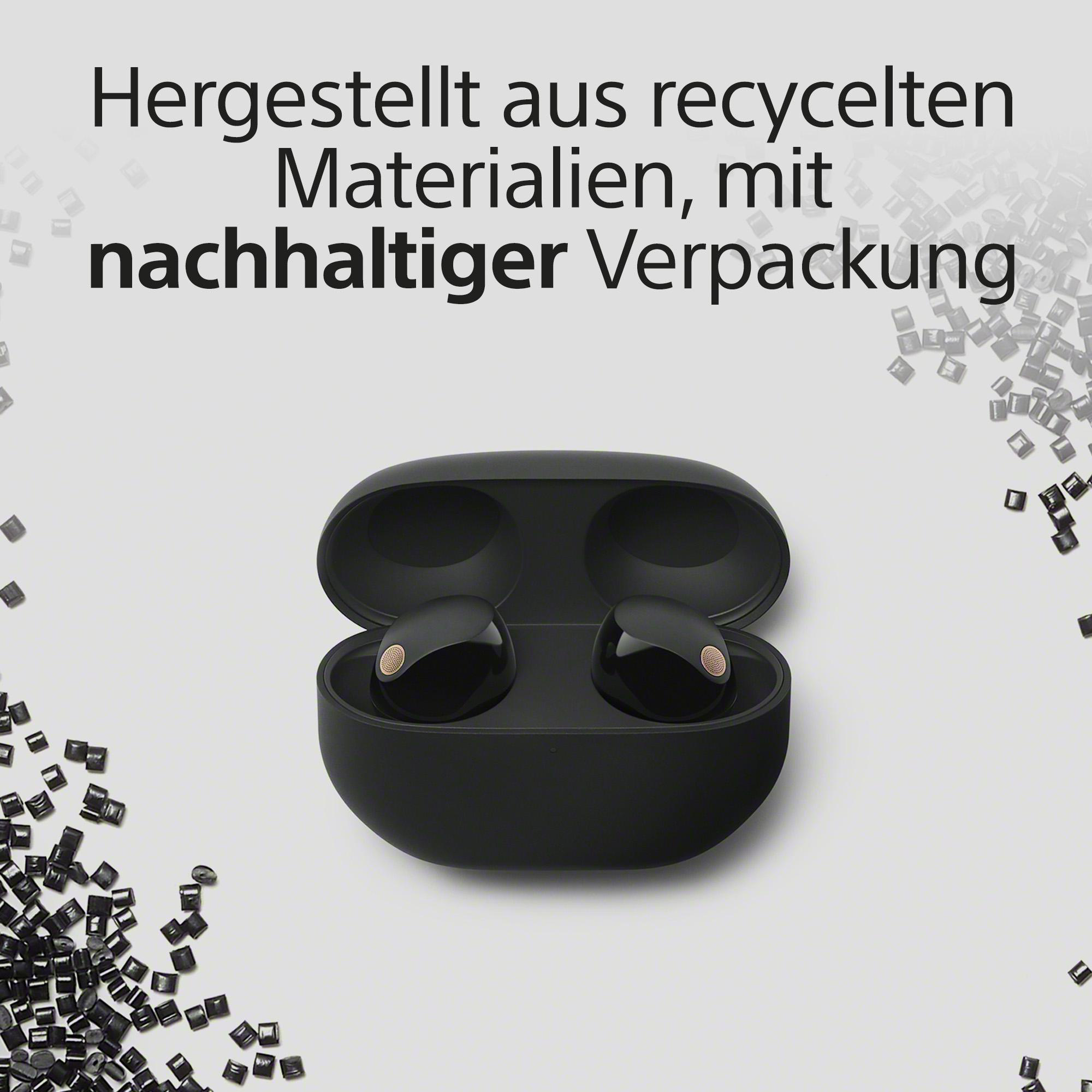 Ein pfirsichfarbenes Telefon, geöffnet, mit Bildschirm.