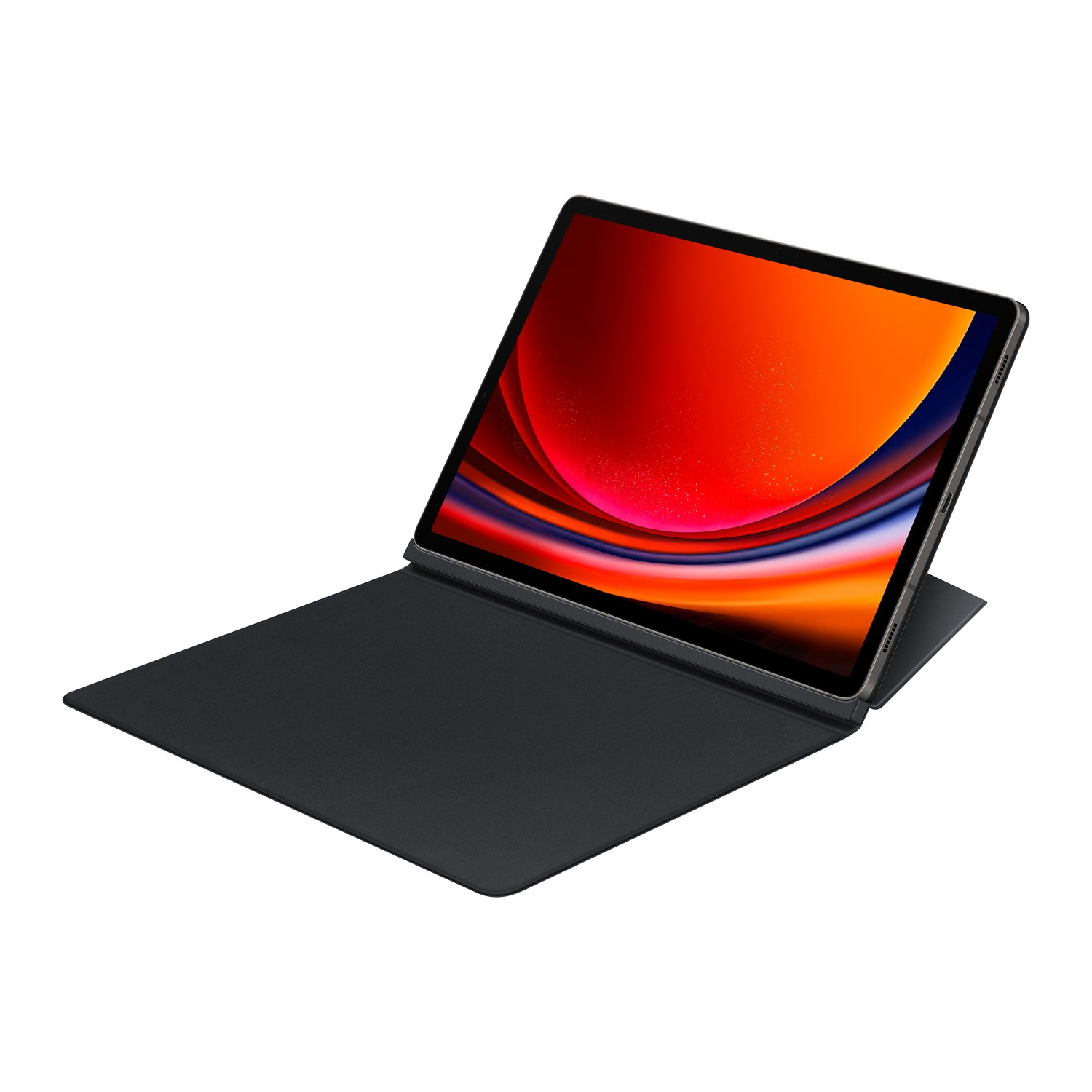 Tablet with a red and orange background on the screen, lying on a black keyboard.