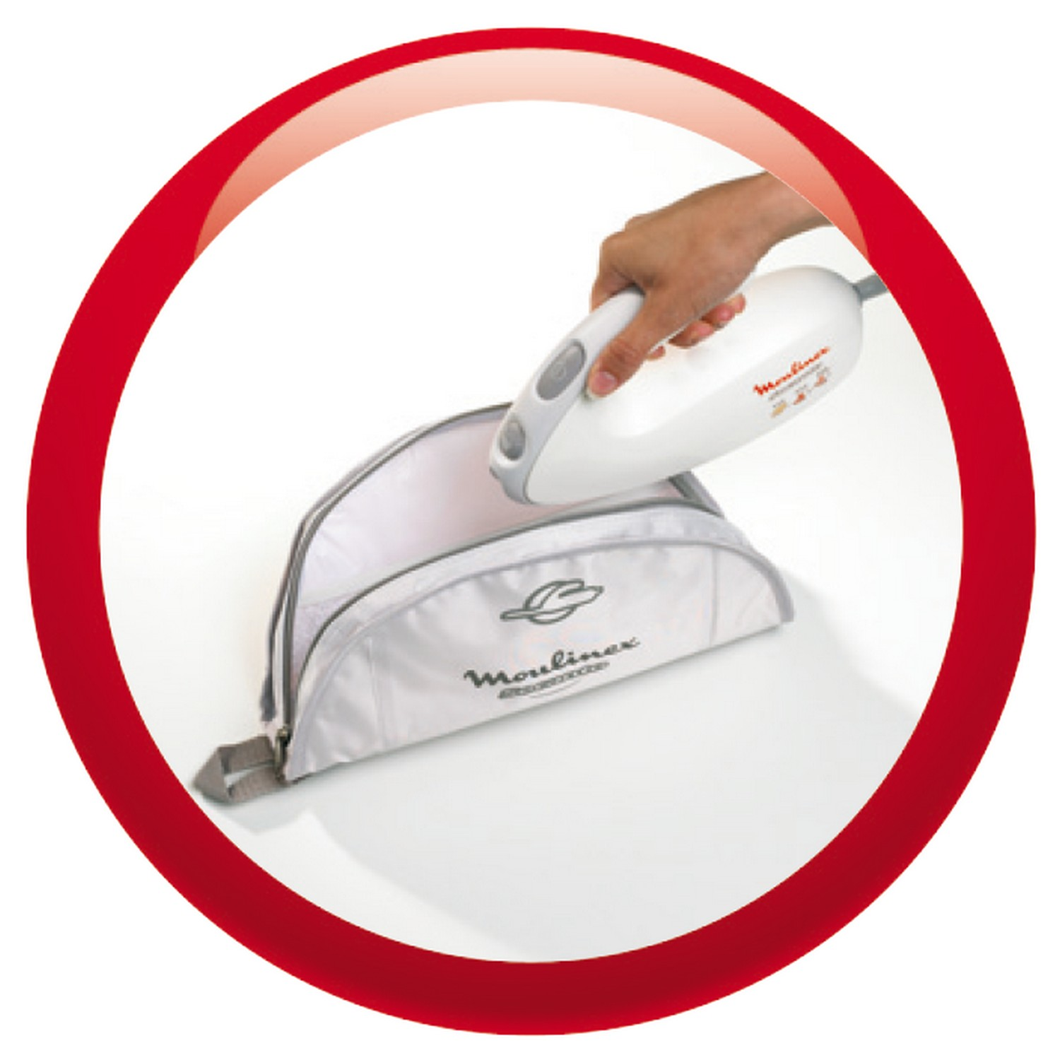 A hand holding a white Moulinex hand blender with an open white bag.