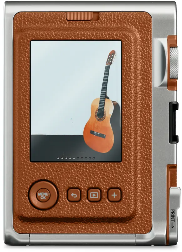 Un appareil photo instantané en cuir marron avec un écran affichant une guitare.