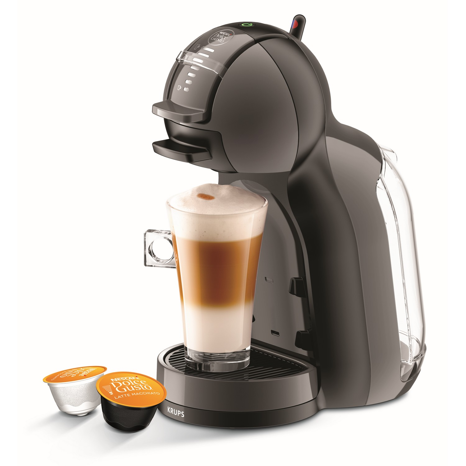 A black Krups Dolce Gusto coffee machine with a glass of latte macchiato.