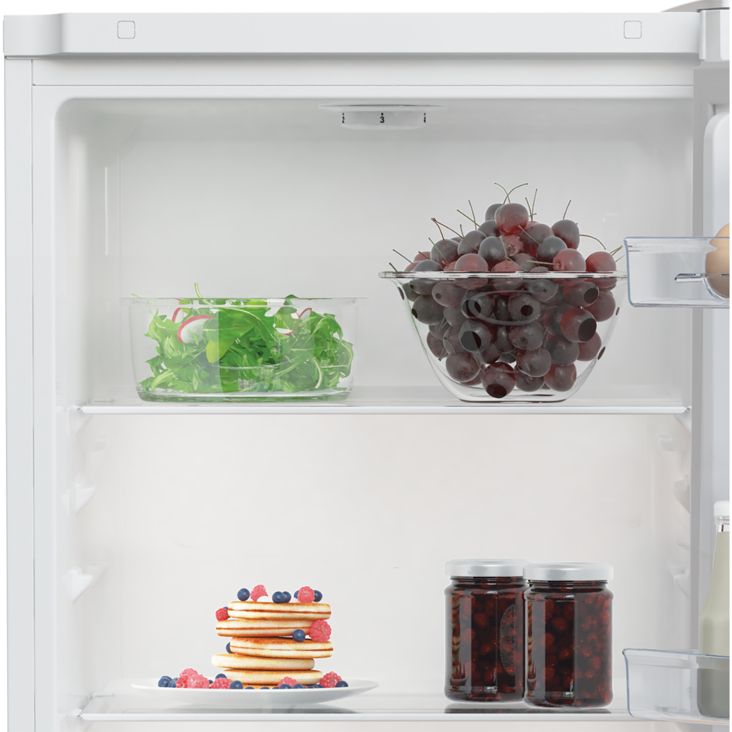 Refrigerator interior with food items.