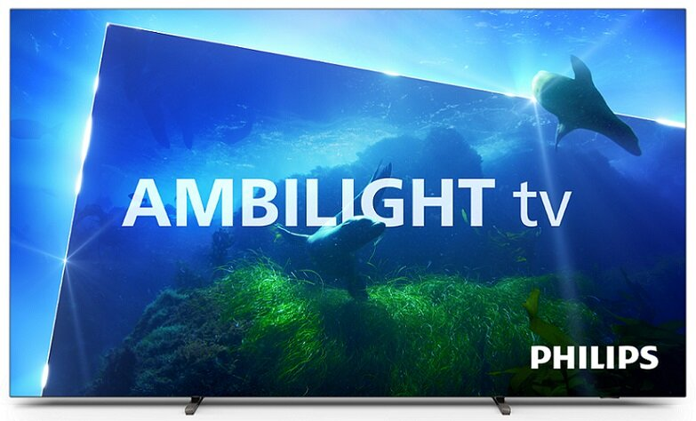 Ekran telewizora Ambilight z podwodną sceną z rybami i roślinami. Widoczne logo Philips.