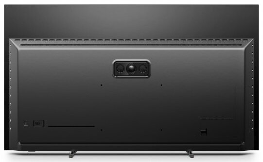 Tył czarnego telewizora. Posiada głośnik, porty i mocowanie.