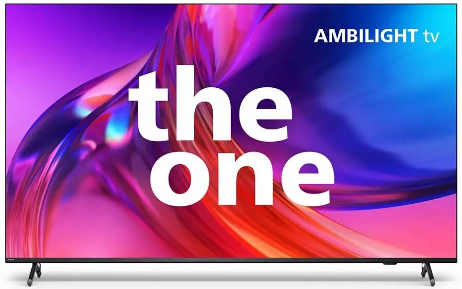 Duży ekran telewizora z kolorową sztuką abstrakcyjną, biały tekst 'the one' i 'Ambilight TV'.