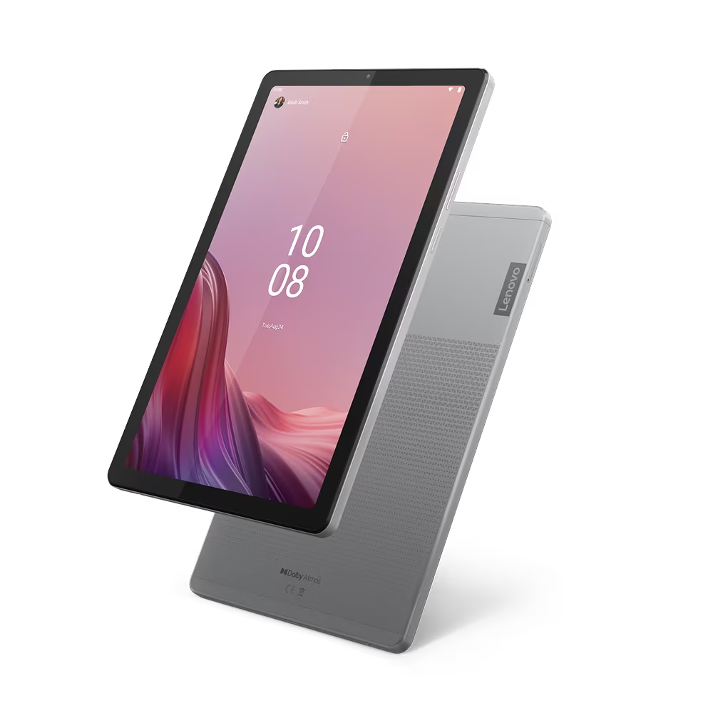 Una tableta en una superficie oscura. La pantalla muestra un diseño rosa y morado. La parte trasera es gris.