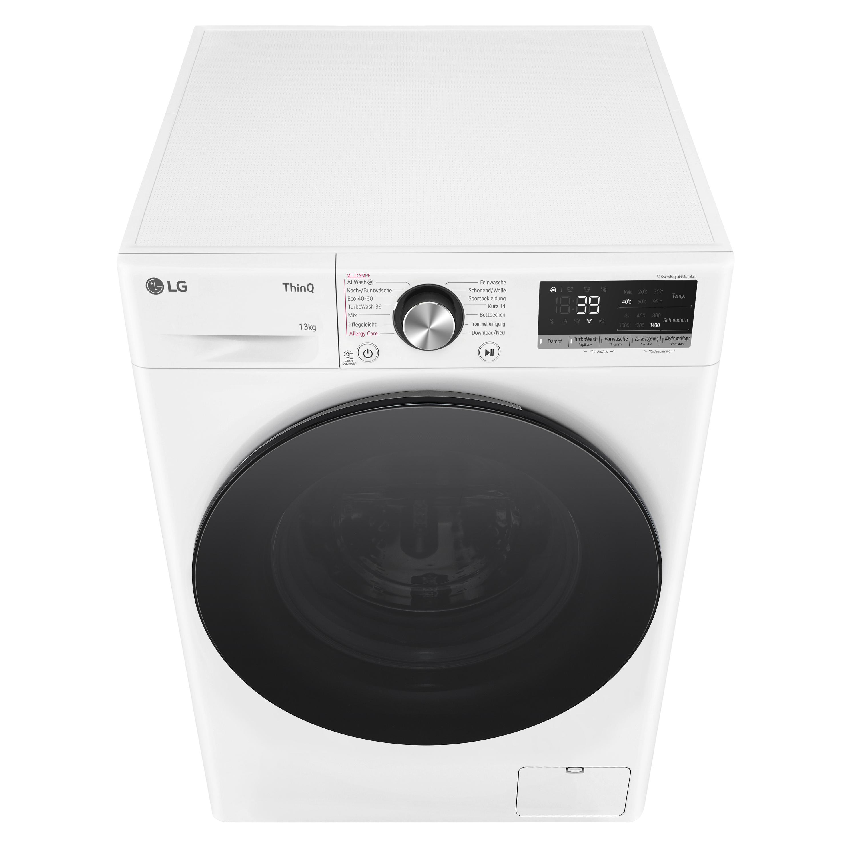 Eine weiße LG Waschmaschine von oben gesehen, mit einer schwarzen Tür.