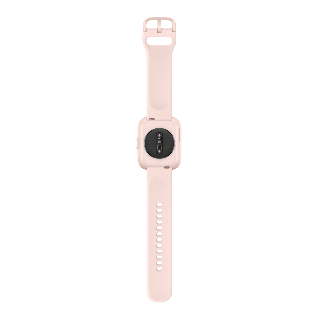 Smartwatch rosa con correa rosa. El reloj está sobre un fondo negro. Se ve la parte trasera del reloj.
