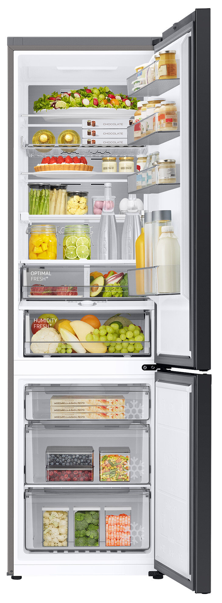 Otwarta lodówka z jedzeniem w środku, dobrze zorganizowane półki i szuflady.